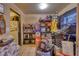 Organized basement with shelving, storage boxes, and essential tools, offering practical utility space at 2508 India Palm Dr, Edgewater, FL 32141
