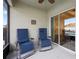 Relaxing screened patio with comfortable seating and sliding glass doors at 2984 Ne 43Rd Rd, Ocala, FL 34470