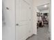 Bathroom featuring walk-in closet, decorative rug and wall-mounted towel hanger at 2984 Ne 43Rd Rd, Ocala, FL 34470