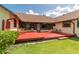 Spacious backyard deck featuring outdoor seating with an expansive backyard and lush green lawn at 3555 Sw 24Th Avenue Rd, Ocala, FL 34471