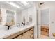 Bathroom featuring an updated vanity and a glass shower with a beige and white design at 3555 Sw 24Th Avenue Rd, Ocala, FL 34471