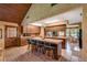 Spacious eat-in kitchen with tile flooring and countertops and wood cabinetry at 3555 Sw 24Th Avenue Rd, Ocala, FL 34471