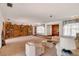 Spacious living room with built-in bookcase and ample seating at 3555 Sw 24Th Avenue Rd, Ocala, FL 34471