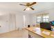 Bright and airy home office with lots of natural light, tan carpet, and neutral paint at 3555 Sw 24Th Avenue Rd, Ocala, FL 34471