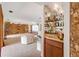 A stylish wet bar complements a spacious living room at 3555 Sw 24Th Avenue Rd, Ocala, FL 34471