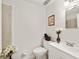 Bathroom features a single vanity sink and ceramic tile backsplash at 3640 Se 131St Ln, Belleview, FL 34420