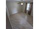 Bedroom features neutral walls, updated flooring, window with curtains, and standard closet at 3650 Se 55Th Ct, Ocala, FL 34480
