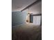 Carpeted bedroom with standard ceiling fan and ensuite bathroom access at 3650 Se 55Th Ct, Ocala, FL 34480
