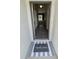 An open entryway provides a glimpse into the home's layout and design with welcome mat at 3650 Se 55Th Ct, Ocala, FL 34480