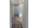 Hallway featuring decorative tile at 3650 Se 55Th Ct, Ocala, FL 34480