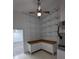 Well-organized pantry with white cabinets, wooden countertops, and extensive shelving for ample storage solutions at 3650 Se 55Th Ct, Ocala, FL 34480