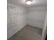 Walk-in closet offering carpet floors and shelving for optimal storage at 3650 Se 55Th Ct, Ocala, FL 34480