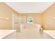 Bright bathroom with a glass enclosed shower, soaking tub and double sink vanity at 3769 Grove View Ln, Port Orange, FL 32129