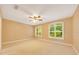 Bedroom featuring neutral walls, plush carpet and windows with shutters at 3769 Grove View Ln, Port Orange, FL 32129