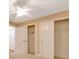 Bedroom boasts double closets for ample storage and neutral carpeting at 3769 Grove View Ln, Port Orange, FL 32129