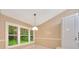 Cozy dining area with white tile floors and views of the outside at 3769 Grove View Ln, Port Orange, FL 32129