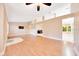 Spacious living room is ready for new residents with a TV already mounted at 3769 Grove View Ln, Port Orange, FL 32129