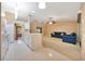 Bright living room showcases an open layout with a modern kitchen and comfortable seating area at 3769 Grove View Ln, Port Orange, FL 32129
