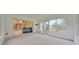 Sunroom boasts sliding glass door access and picturesque views of the backyard at 3769 Grove View Ln, Port Orange, FL 32129
