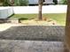 Paver patio with a view of fenced yard and a mature palm tree at 3983 Sw 51St Ct, Ocala, FL 34474