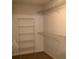 Walk-in closet with wire shelving, offering ample storage space and organization at 3983 Sw 51St Ct, Ocala, FL 34474