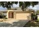 Inviting single-story home with a spacious driveway and attached two car garage at 3983 Sw 51St Ct, Ocala, FL 34474