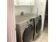 Laundry room with a newer Samsung washer and dryer at 3983 Sw 51St Ct, Ocala, FL 34474
