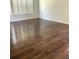 Living room featuring a large window and hardwood floors at 3983 Sw 51St Ct, Ocala, FL 34474