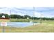 Outdoor basketball and tennis court with signage indicating it is recreational area for residents at 3983 Sw 51St Ct, Ocala, FL 34474