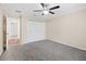 Cozy bedroom featuring carpeted floors and a closet with double doors at 4360 Se 106Th St, Belleview, FL 34420