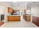 Kitchen with granite countertops, stainless appliances, and tiled floor at 4360 Se 106Th St, Belleview, FL 34420