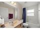 Bathroom featuring tub/shower, and a single vanity with colorful mirror trim at 4555 Nw 6Th Cir, Ocala, FL 34475