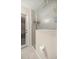 Bathroom featuring a glass enclosed shower with a door to the exterior at 4555 Nw 6Th Cir, Ocala, FL 34475