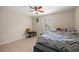 Bedroom featuring neutral walls, a ceiling fan and tile floors at 4555 Nw 6Th Cir, Ocala, FL 34475
