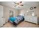 Bedroom featuring neutral walls, a ceiling fan and tile floors at 4555 Nw 6Th Cir, Ocala, FL 34475