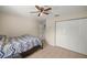 Bedroom featuring neutral walls, a ceiling fan and tile floors at 4555 Nw 6Th Cir, Ocala, FL 34475