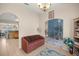 Comfortable living room offers archways, tile flooring, and great natural light at 4555 Nw 6Th Cir, Ocala, FL 34475