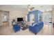 Bright living room with ample natural light, tile floors, and view of the front entry at 4555 Nw 6Th Cir, Ocala, FL 34475