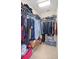 Fully organized walk-in closet with ample space for clothing and accessories at 4555 Nw 6Th Cir, Ocala, FL 34475
