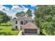Stunning home with a two-car garage and beautifully maintained lawn at 4602 Se 28Th St, Ocala, FL 34480