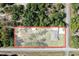 Aerial view of a sprawling lot showing house location and building area, surrounded by trees at 4661 Sw Gardenia Ct, Dunnellon, FL 34431