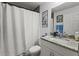 Bathroom featuring shower and tub, granite vanity, and a white toilet at 4661 Sw Gardenia Ct, Dunnellon, FL 34431
