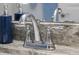Bathroom sink with marble countertop and chrome faucet at 4661 Sw Gardenia Ct, Dunnellon, FL 34431