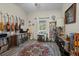 Bonus room with vinyl flooring, a window, and musical instruments at 4661 Sw Gardenia Ct, Dunnellon, FL 34431