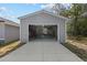 Detached two-car garage with bright lighting and plenty of room for storage or a workshop at 4661 Sw Gardenia Ct, Dunnellon, FL 34431