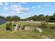View of the garden featuring containers and lush plants, offering a serene outdoor space at 4661 Sw Gardenia Ct, Dunnellon, FL 34431