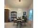 Cozy dining area featuring stylish lighting and a window for natural light at 530 Casteel Ave, The Villages, FL 32163
