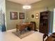 Inviting office with a wooden desk, decor, and custom shelving at 530 Casteel Ave, The Villages, FL 32163