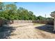 Large, fenced backyard with plenty of space for entertaining or creating your own outdoor oasis at 5740 Nw 61St St, Ocala, FL 34482