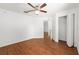 This bright bedroom features wood floors and a closet for optimal storage at 5740 Nw 61St St, Ocala, FL 34482